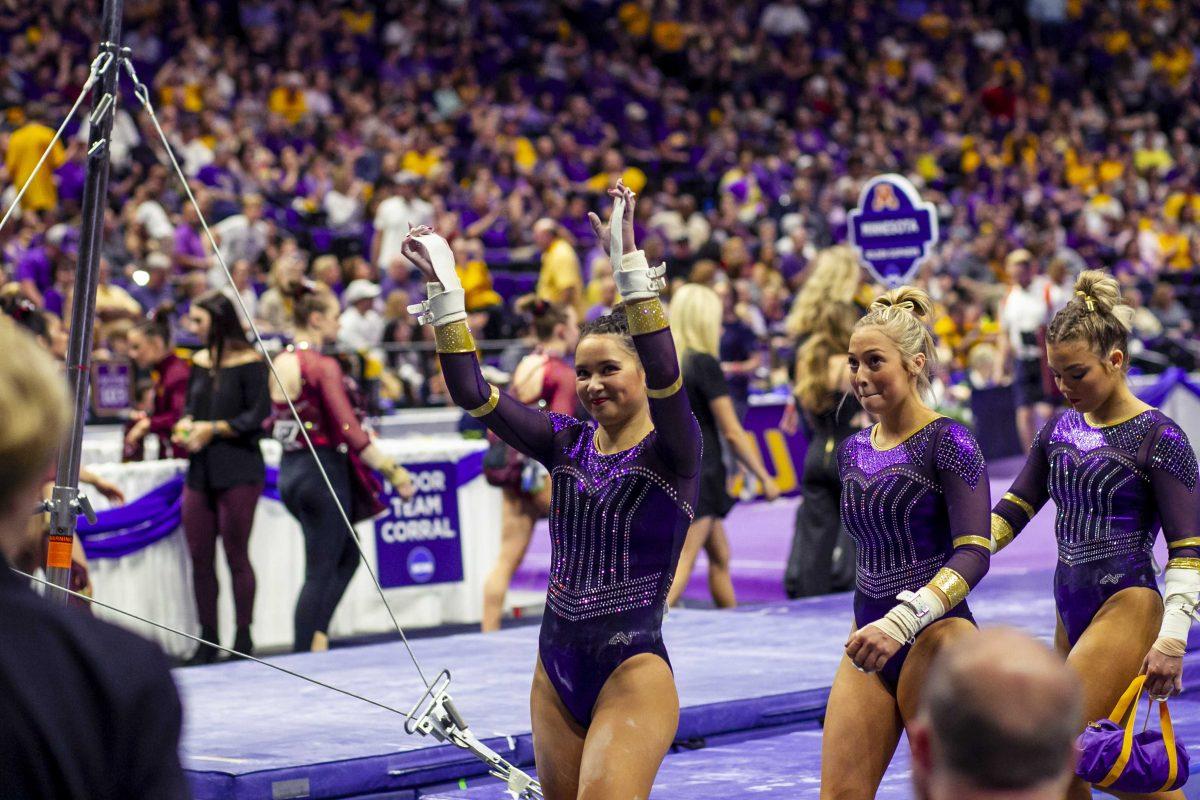 LSU senior all-around Sarah Finnegan waves to the crowd during the second round of the gymnastics regionals on Saturday, April 6, 2019, in the PMAC.