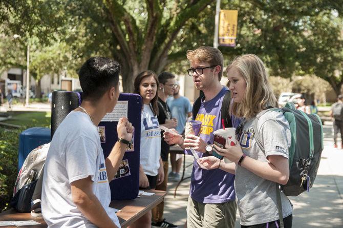 An LSU Ambassador talks to students at Free Speech Alley on Sept. 1, 2017.