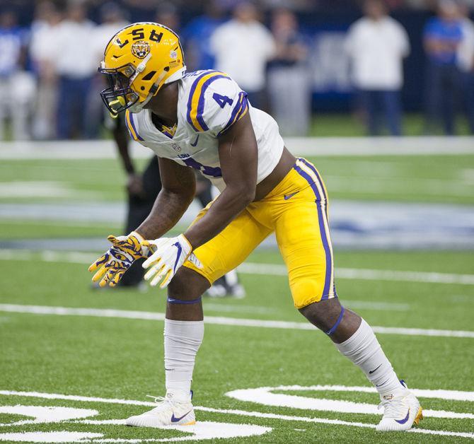 LSU freshman offense line backer K'Lavon Chaisson (4) prepares before a play on Saturday, Sep. 2, 2017, during the Tigers' 27-0 win against the BYU Cougars in the Mercedes-Benz Superdome in New Orleans, Louisiana.