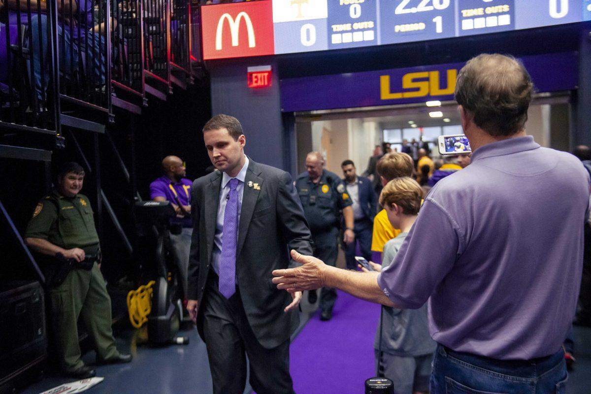 LSU basketball coach Will Wade interacts with fans during the Tigers' 82-80 victory over Tennessee on Saturday, Feb. 23, 2019, in the PMAC