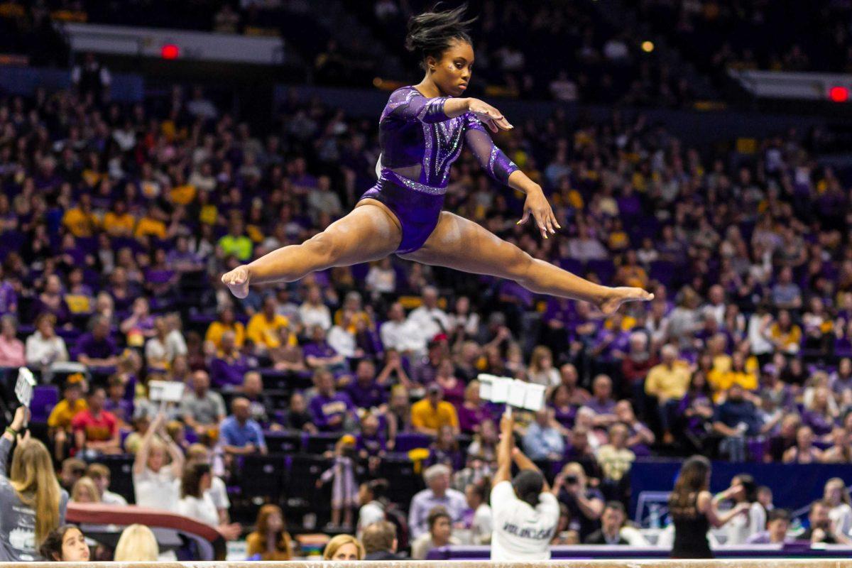 LSU junior all-around Kennedi Edney performs on the balance beam during the gymnastics regionals in the PMAC on Friday, April 5, 2019.