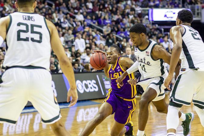 LSU freshman guard Ja'vonte Smart (1) drives to the basket during the Tigers' 63-80 loss to Michigan State in the Capital One Arena on Friday, March 29, 2019.