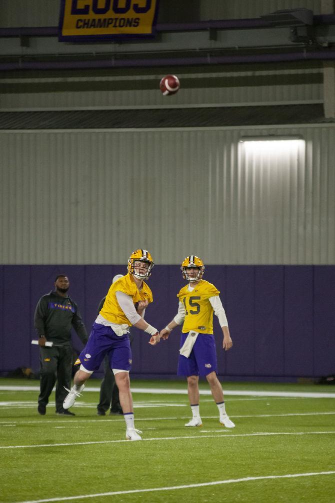 LSU junior quarterback Joe Burrow (9) participates in spring practice in the LSU Football Facility on Thursday, March 7, 2019.