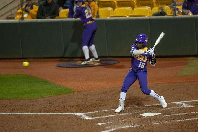 <p>LSU sophomore outfielder Taryn Antoine (16) hits the ball during the Lady Tigers' 19-1 victory over Tulsa, Thursday, Feb. 7, 2019, in Tiger Park.</p>