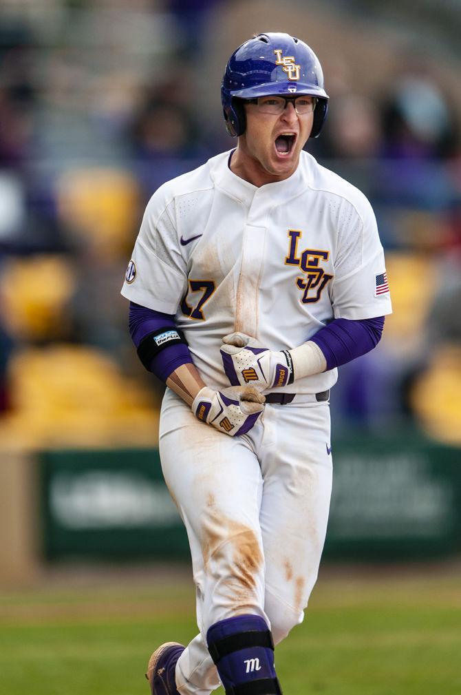 LSU senior infielder Chris Reid (17) celebrates during the Tigers' 2-1 victory over Kentucky on Saturday, March 16, 2019, in Alex Box Stadium.