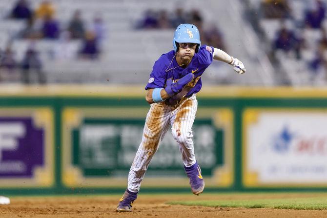 LSU freshman outfielder Giovanni DiGiacomo (7) runs to third during the Tigers' 5-3 victory over Lamar on Tuesday, April 23, 2019, in Alex Box Stadium.