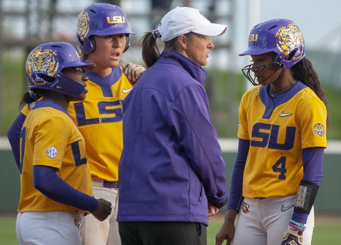 <p>LSU softball coach Beth Torina talks to her players during the Tigers’ 8-0 win over the Florida Gators on Sunday, March 17, 2019, at Tiger Park.</p>