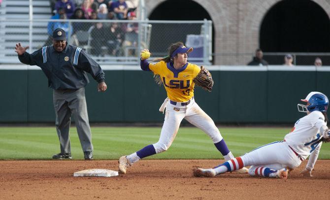 LSU senior infielder Amber Serrett (17) throws the ball during the Tigers&#8217; 8-0 win over the Florida Gators on Sunday, March 17, 2019, at Tiger Park.