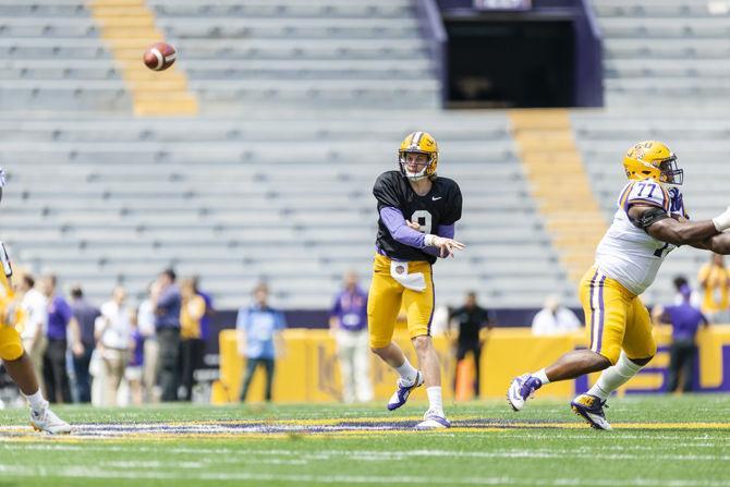 LSU senior quarterback Joe Burrow (9) throws the ball during the Tigers' spring football game in Tiger Stadium on Saturday, April 6, 2019.