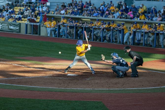 LSU junior infielder Josh Smith (4) hits the ball during the Tigers&#8217; 7-8 loss against University of New Orleans in Alex Box Stadium on Sunday Oct. 14, 2018.