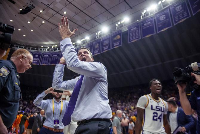 LSU coach Will Wade celebrates after the Tigers 82-80 victory over Tennesse on Saturday, Feb. 23, 2019.