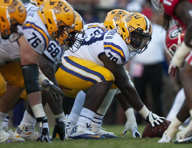 LSU sophomore center Lloyd Cushenberry III (79) prepares to snap the ball during the Tigers' 36-16 victory against Georgia&#160;at Tiger Stadium on Saturday, Oct. 13, 2018.