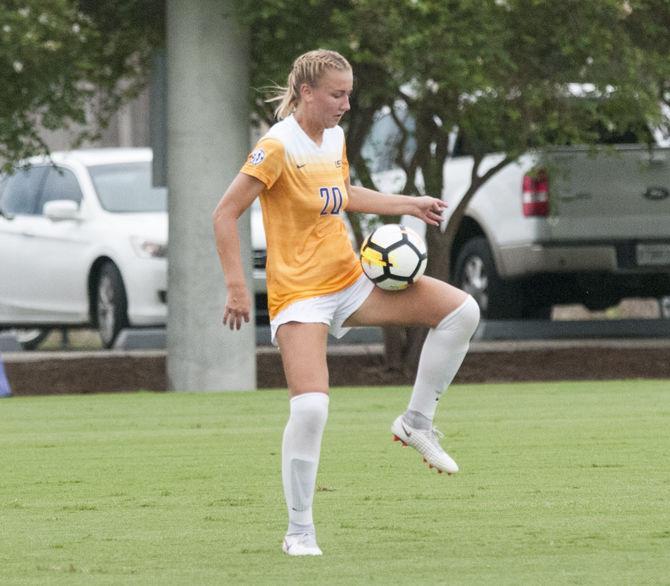 LSU junior midfielder Marlena Cutura (20) dribbles the ball during the Tigers' 2-0 win over the Samford Bulldogs on Sunday, Sept. 9, 2018, at the LSU Soccer Complex.