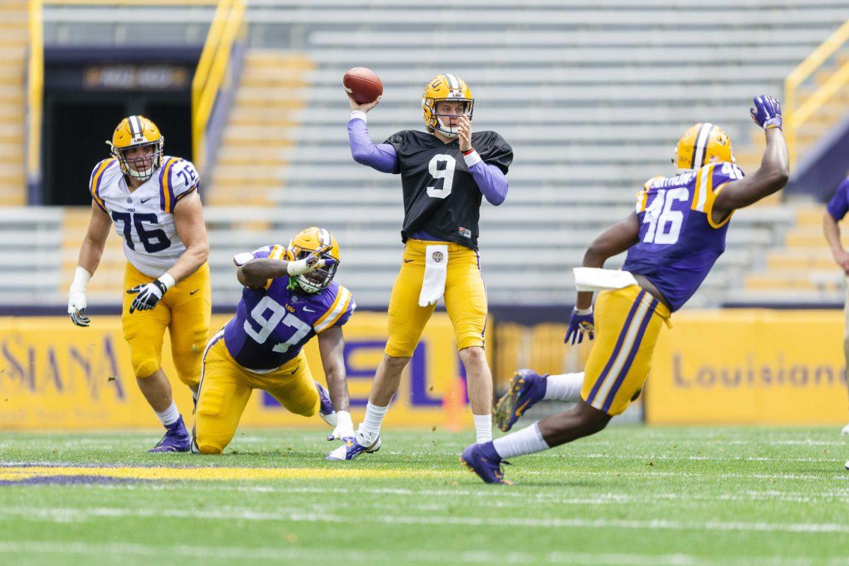 LSU senior quarterback Joe Burrow (9) throws the ball during the Tigers spring football game in Tiger Stadium on Saturday, April 6, 2019.