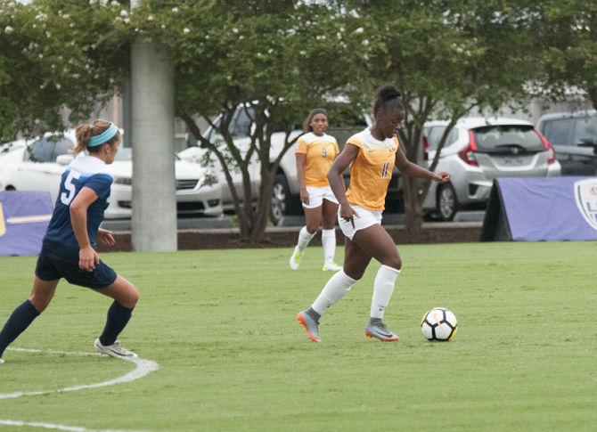 LSU sophomore forward Tinaya Alexander (11) dribbles the ball during the Tigers' 2-0 win over the Samford Bulldogs on Sunday, Sept. 9, 2018, at the LSU Soccer Complex.