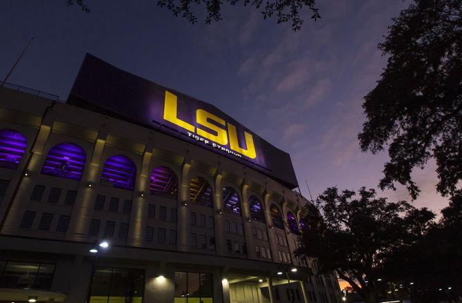 The sun sets above Tiger Stadium on Monday, Jan. 21, 2019.