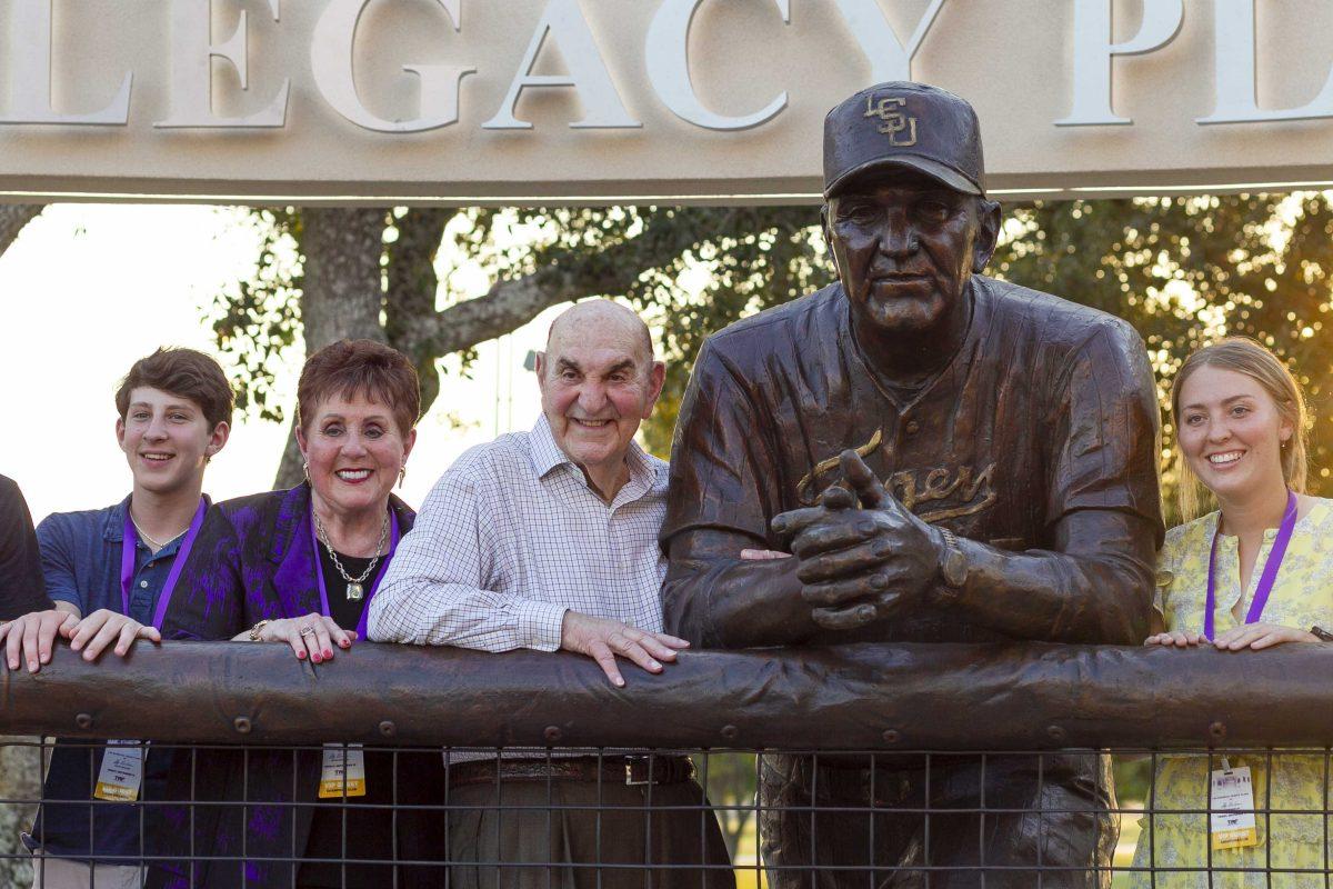 Skip Bertman poses for a photo after the reveal of his statue at Alex Box Stadium on Friday, Sept. 13, 2019.