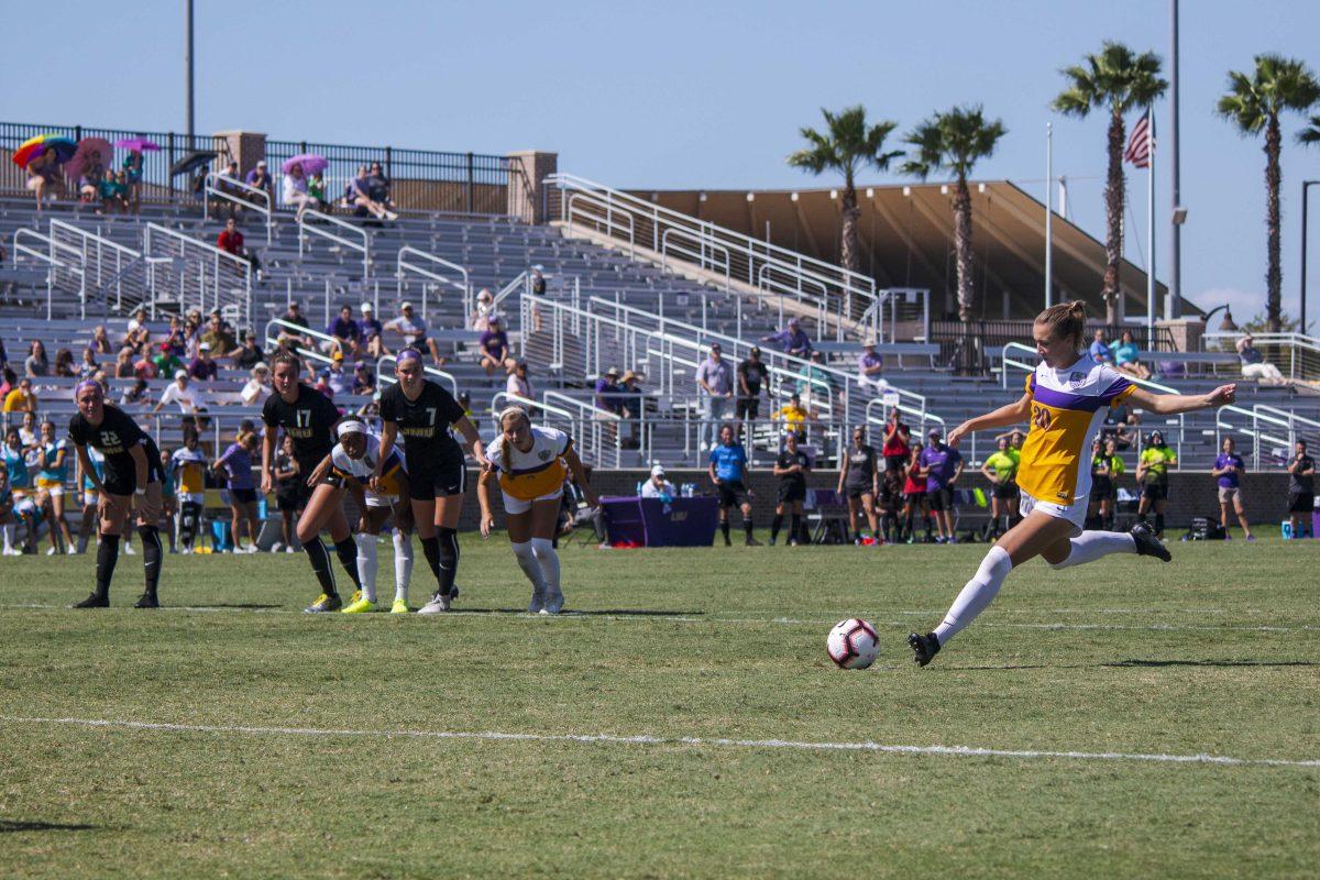 LSU senior midfielder Marlena Cutura (20) shoots a penalty kick on Sunday, Sept. 22, 2019, during the Tigers' 0-1 loss against JMU at the LSU Soccer Complex.