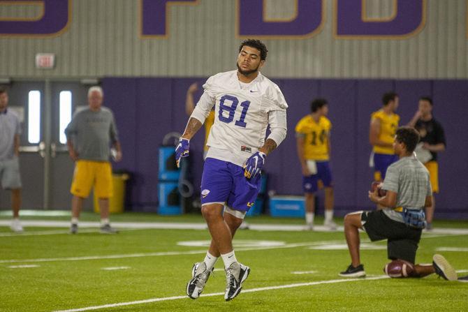 LSU junior tight-end Thaddeus Moss (81) participates in practice in the LSU Indoor Practice Facility on Monday, Aug. 26, 2019.