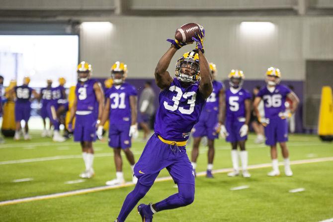 LSU junior safety Todd Harris Jr. (33) participates in spring practice in the LSU Football Facility on Thursday, March 7, 2019.