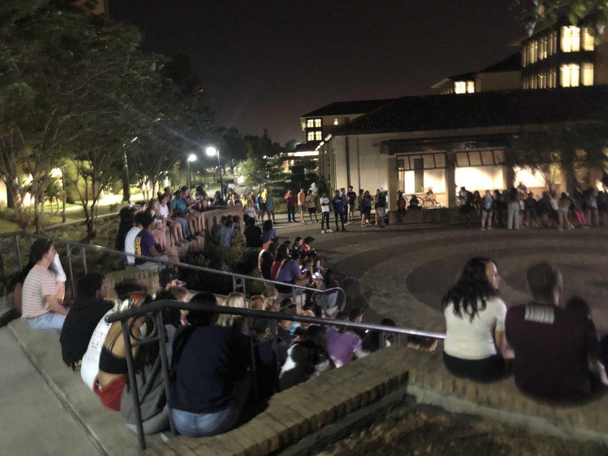 Around 150 students gathered to mourn the loss of University student with a vigil outside of Cypress Hall.&#160;