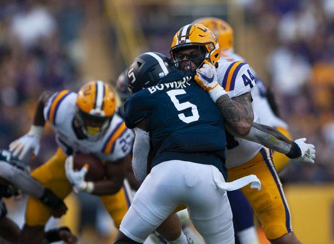 LSU junior full back Tory Carter (44) makes a tackle during the Tigers' 55-3 victory over Georgia Southern on Saturday, Aug. 31, 2019, at Tiger Stadium.