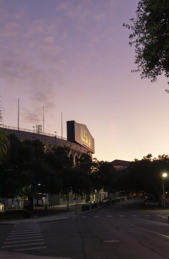 The sun sets above Tiger Stadium on Monday, Jan. 21, 2019.