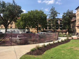 Construction takes place behind Highland Hall on Aug. 30, 2019.