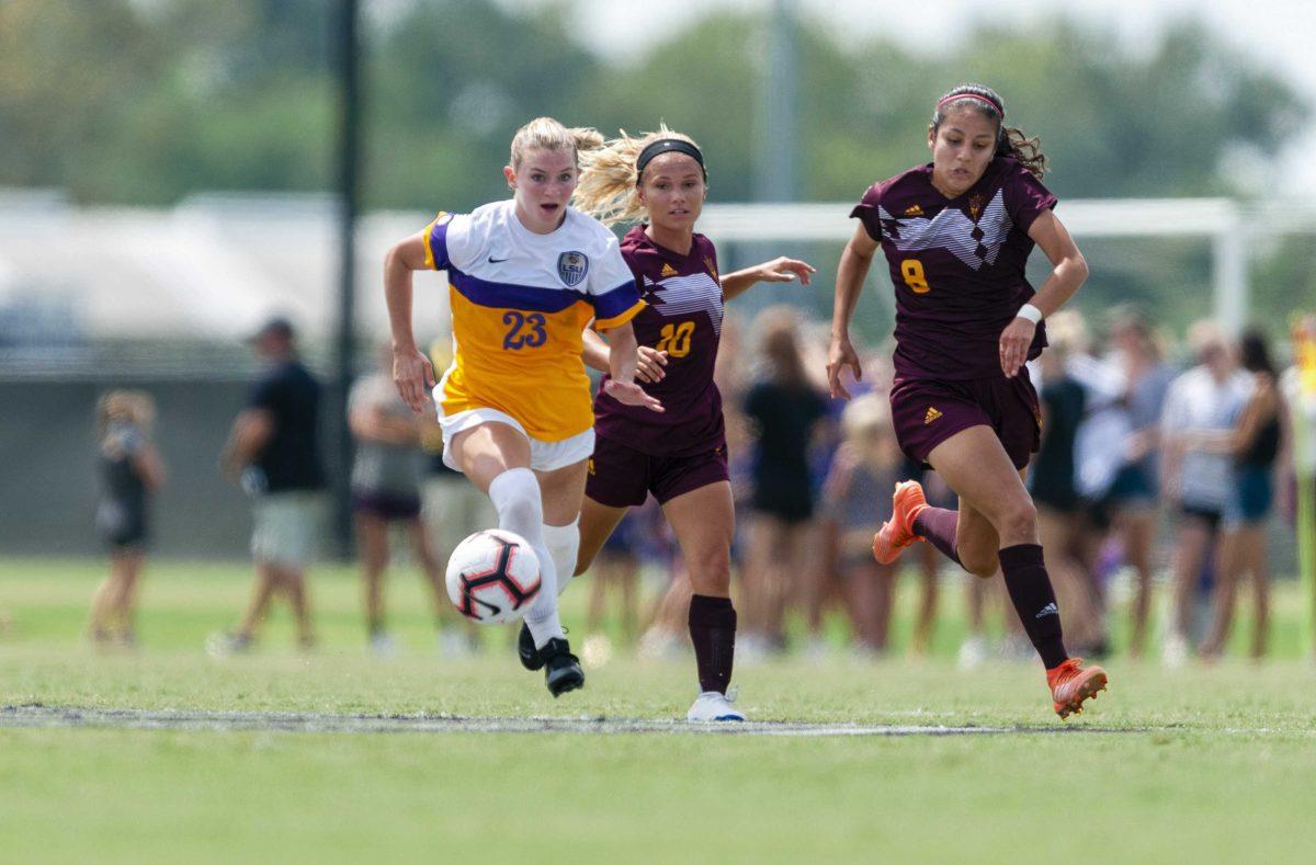 LSU freshman Midfielder Maddie Moreau (23) dribbles the ball during the Tigers' 1-0 defeat against Arizona State on Saturday, Sept. 15, 2019, in the LSU Soccer Complex.