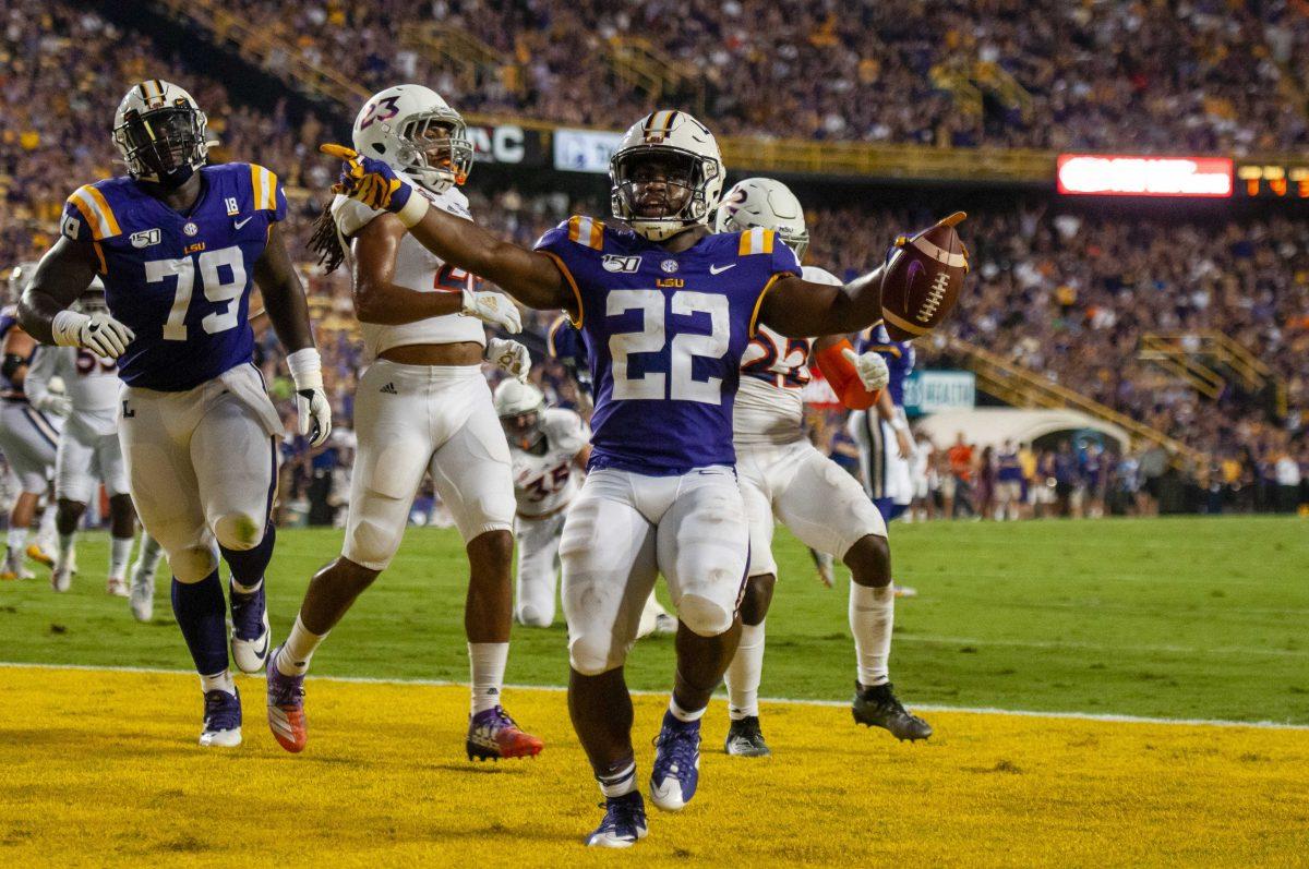 LSU junior running back Clyde Edwards-Helaire (22) scores a touchdown during the Tigers' game against Northwestern State on Saturday, Sept. 14, 2019, in Tiger Stadium.