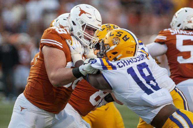 LSU sophomore offensive line backer K&#8217;Lavon Chaisson (18) blocks the opposing defense during the Tigers' 45-38 victory over Texas on Saturday, Sept. 7, 2019, at Darrell K Royal&#8211;Texas Memorial Stadium.