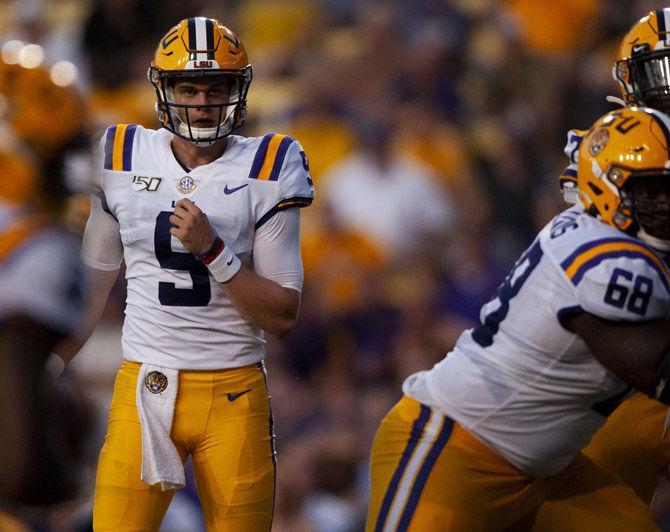 LSU senior quarterback Joe Burrow (9) watches a play during the Tigers' 55-3 victory over Georgia Southern on Saturday, Aug. 31, 2019, at Tiger Stadium.