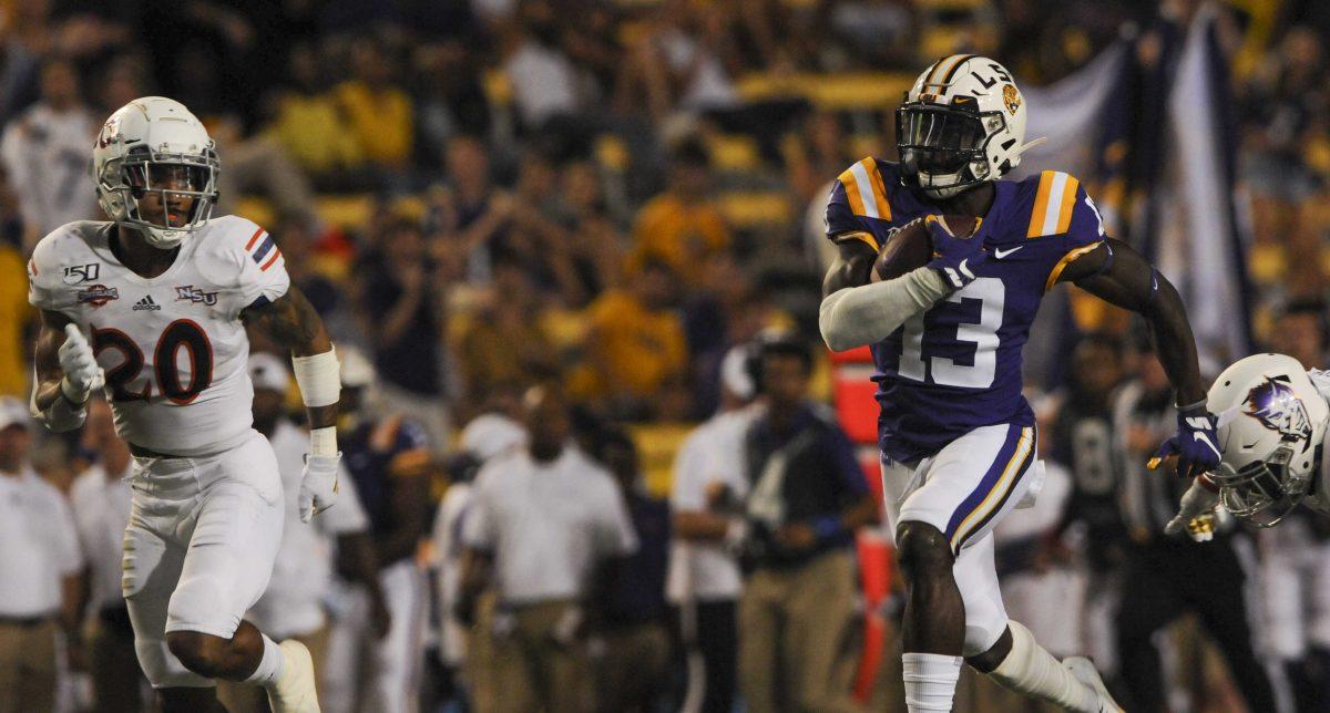 LSU junior wide receiver Jontre Kirklin (13) runs after the catch in Tiger Stadium on Saturday, Sept. 14, 2019