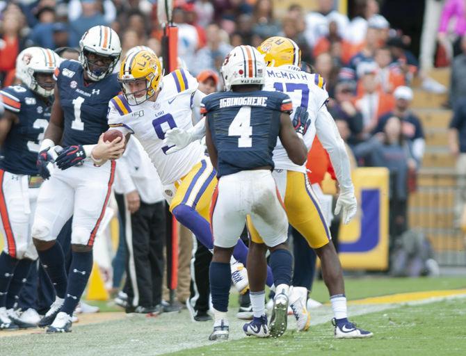 LSU senior quarterback Joe Burrow (9) runs the ball during the Tigers' game against Auburn on Saturday, Oct. 26, 2019, at Tiger Stadium.