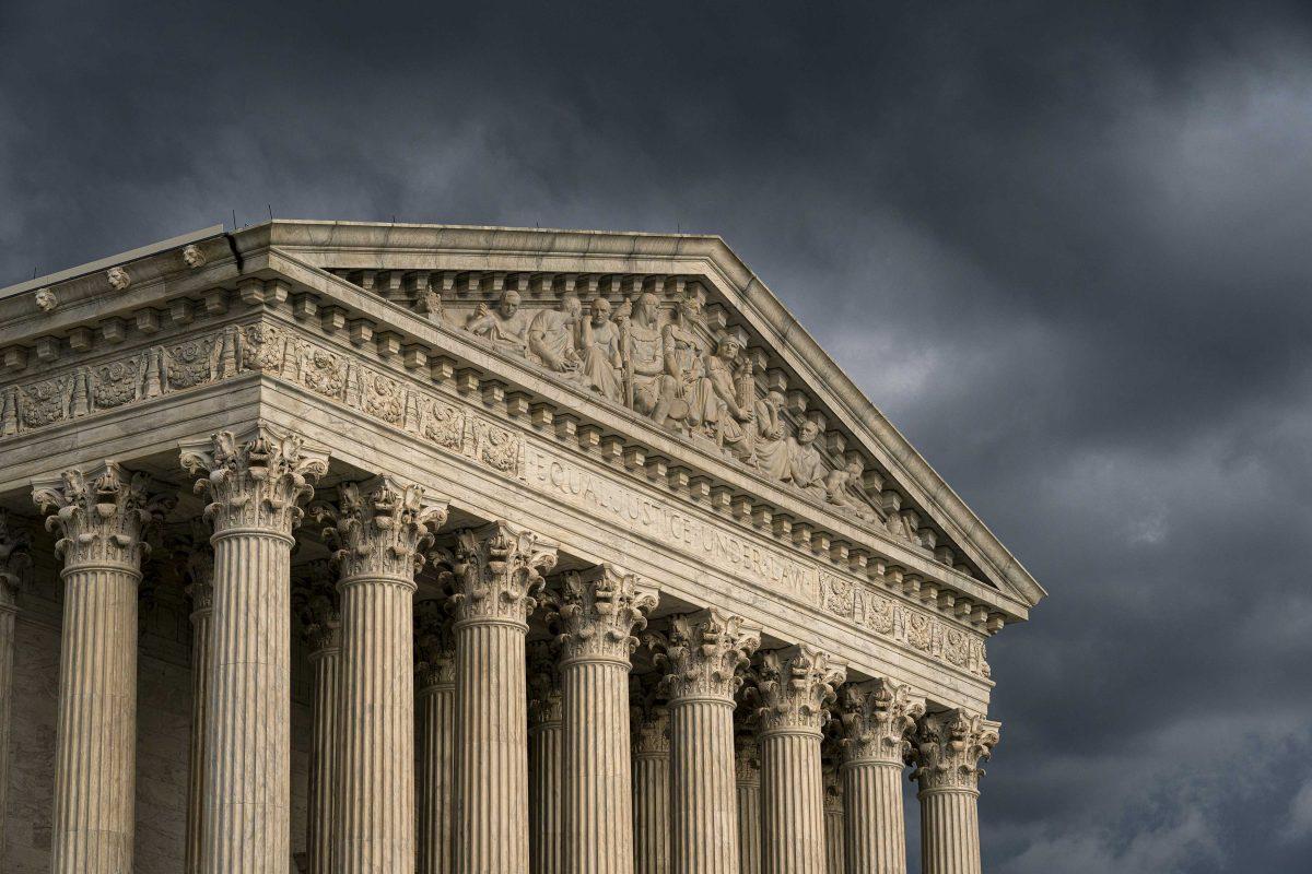 FILE - In this June 20, 2019 file photo, The Supreme Court is seen under stormy skies in Washington. The Supreme Court is adding an abortion case to its busy election-year docket. The justices have agreed to take up a Louisiana law that could leave the state with just one clinic. The justices won&#8217;t hear arguments until the winter. A decision is likely to come by the end of June. (AP Photo/J. Scott Applewhite)