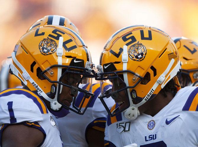 LSU football players celebrate after a touchdown during the Tigers' 55-3 victory over Georgia Southern on Saturday, Aug. 31, 2019, at Tiger Stadium.