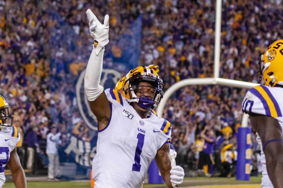 LSU sophomore wide receiver Ja'Marr Chase (01) celebrates after a play during the Tigers' 42-28 victory over Florida on Saturday, Oct. 12, 2019, at Tiger Stadium.