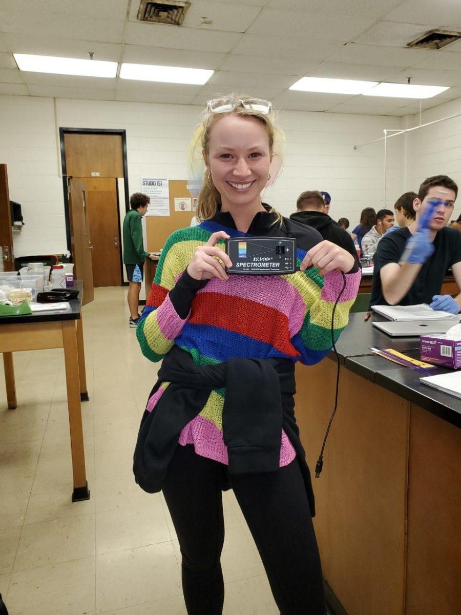 Biological sciences pre-dental freshman Kylie Madere dresses as a spectrometer to receive 5% extra credit in her biology class on Oct. 30, 2019.