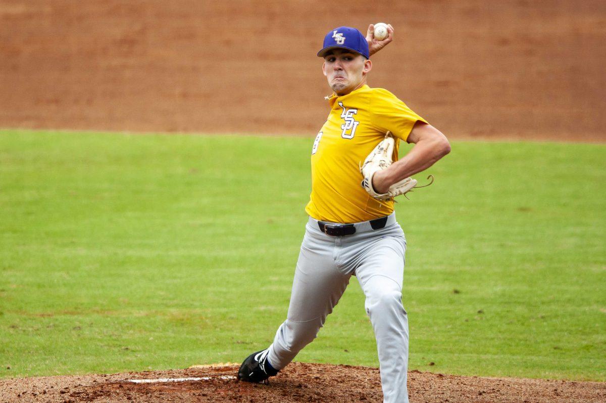 LSU sophomore pitcher Cole Henry (18) throws the ball during the Tigers' 4-3 victory over the University of New Orleans in Alex Box Stadium on Sunday, Oct. 27, 2019.