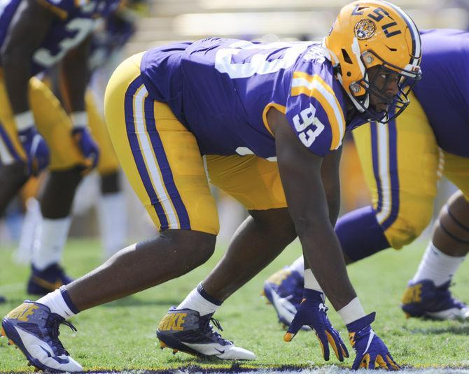 LSU junior defensive end Justin Thomas (93) waits on the line during the Tigers' 46-6 victory over Utah State on Saturday, Oct. 5, 2019, at Tiger Stadium.