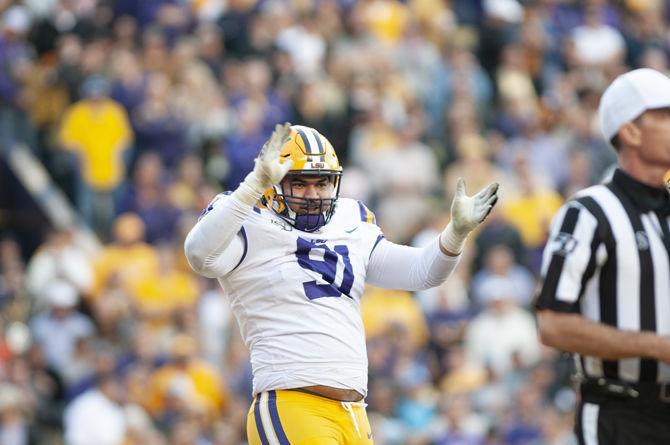 LSU senior defensive linemen Rashard Lawrence (90) celebrates during the Tigers' 23-20 win over Auburn on Saturday, Oct. 26, 2019, at Tiger Stadium.