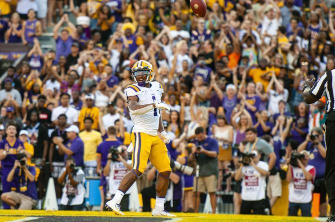 LSU sophomore wide receiver Ja'Marr Chase (1) celebrates after a touchdown during the Tigers' 55-3 victory over Georgia Southern on Saturday, Aug. 31, 2019, at Tiger Stadium.