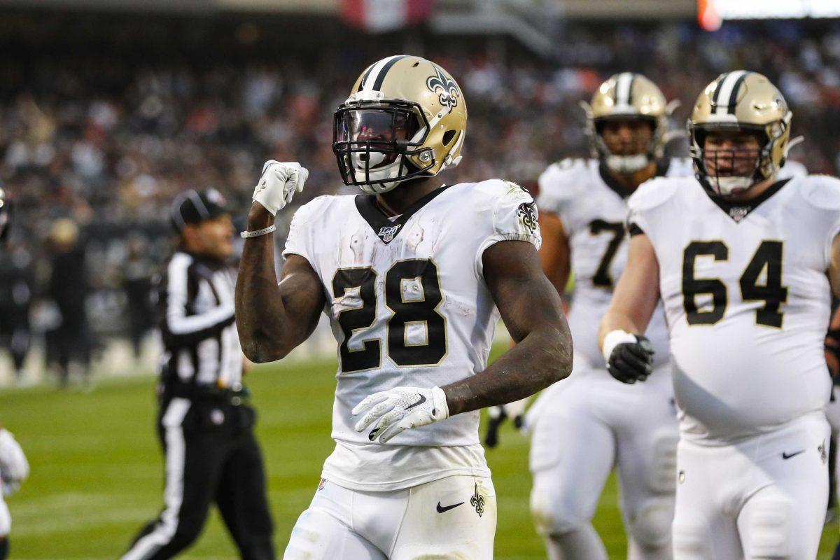 New Orleans Saints running back Latavius Murray (28) celebrates a touchdown during the second half of an NFL football game against the Chicago Bears in Chicago, Sunday, Oct. 20, 2019. (AP Photo/Charles Rex Arbogast)