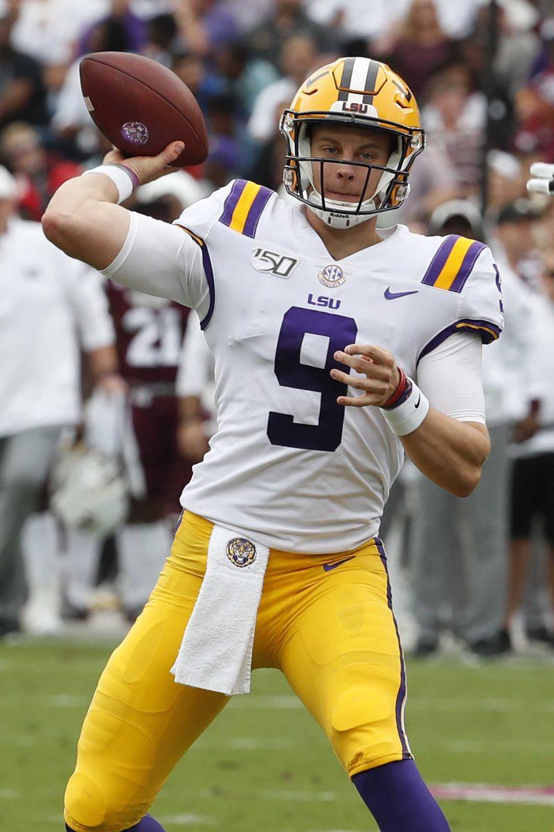 LSU quarterback Joe Burrow (9) passes for a first down against Mississippi State during the first half of their NCAA college football game in Starkville, Miss., Saturday, Oct. 19, 2019. (AP Photo/Rogelio V. Solis)