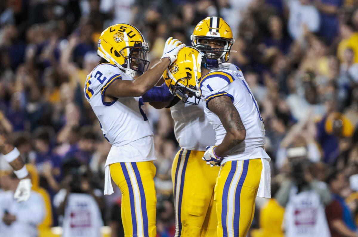 LSU junior wide receiver Justin Jefferson (2) crowns sophomore wide receiver Ja'Marr Chase (1) on Saturday, Oct. 12, 2019, during the Tigers' 42-28 victory against the Gators in Tiger Stadium.