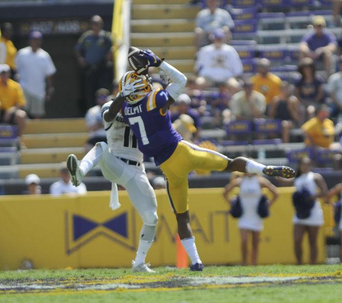 LSU junior safety Grant Delpit (7) catches an interception during the Tigers' 46-6 victory over Utah State on Saturday, Oct. 5, 2019, at Tiger Stadium.