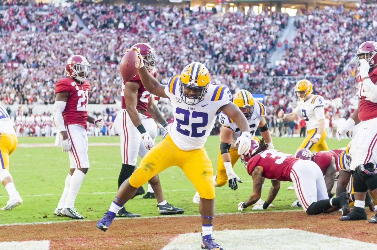 LSU junior running back Clyde Edwards-Helaire (22) celebrates after a touchdown during the Tigers' game against Alabama in Bryant-Denny Stadium on Saturday, Nov. 9, 2019.