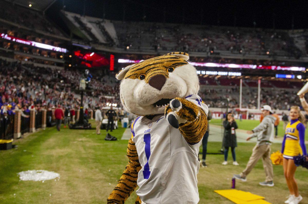 Mike the Tiger celebrates after the Tigers' 46-41 victory over Alabama in Bryant-Denny Stadium on Saturday, Nov. 9, 2019.