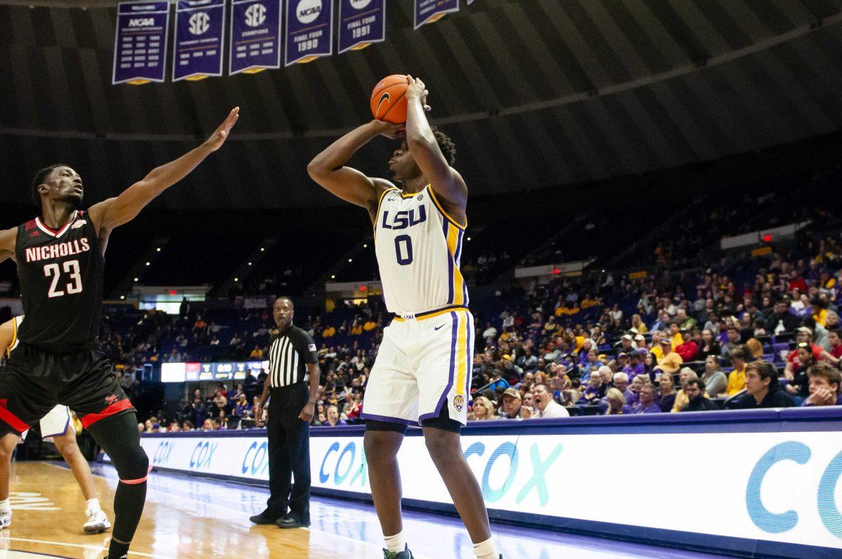 LSU sophomore forward Darius Days (0) shoots a three during the Tigers' 75-65 victory over Nicholls on Saturday, Nov. 16, 2019, in the PMAC.