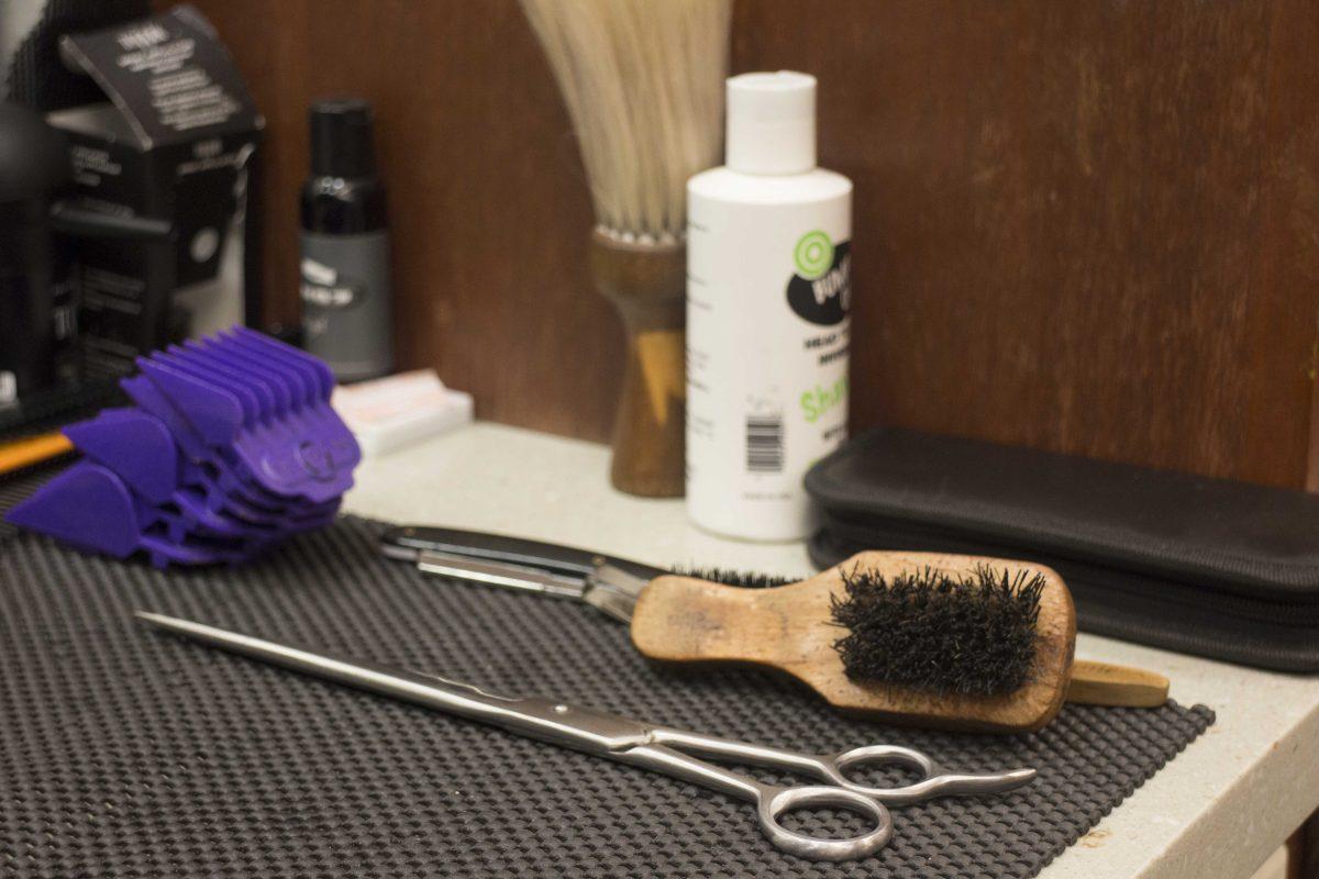 Barber tools are set on the desk at the Dorm Room Kutz barbershop inside the Student Union on Monday, Jan. 9, 2017.